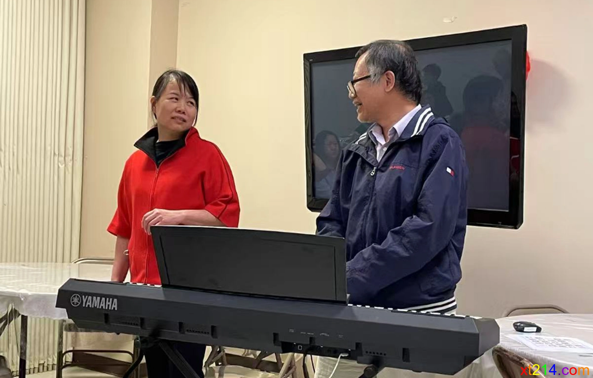 荣秀姊妹和小川弟兄在教会服事